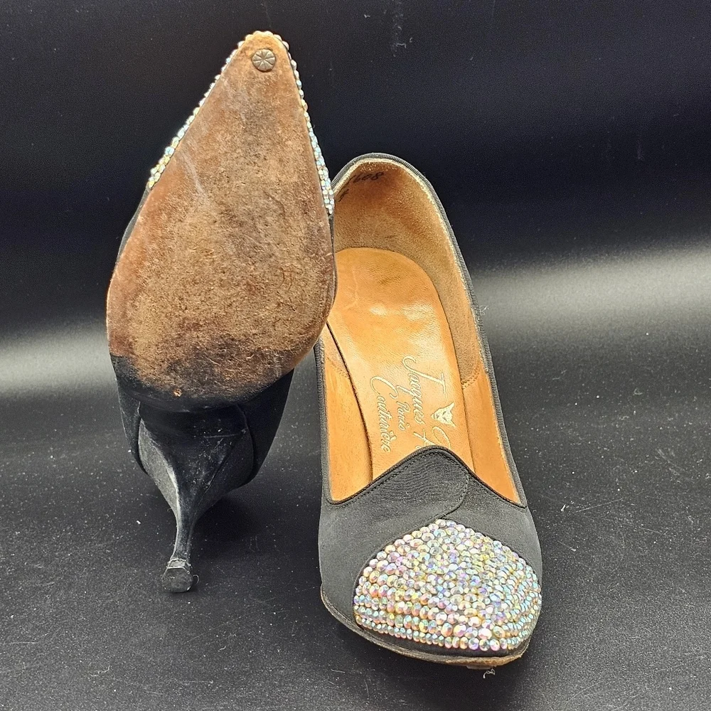 Jacques Heim pumps with a rhinestone-embellished toe.